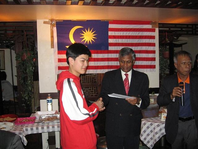 IMG_0088 (2).jpg - second prize winner ... Khoo Phaik Sim, here being represented by her son winner of a 4 days, 4 nights stay at the Hotel Istana in KL sponsored by Vacation Borneo